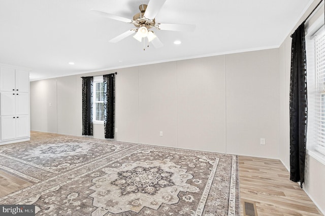 541 Furnace Hills Pike Unit 1, Lititz, PA 17543 - unfurnished room featuring light wood-style flooring, a ceiling fan, ornamental molding, a decorative wall, and recessed lighting