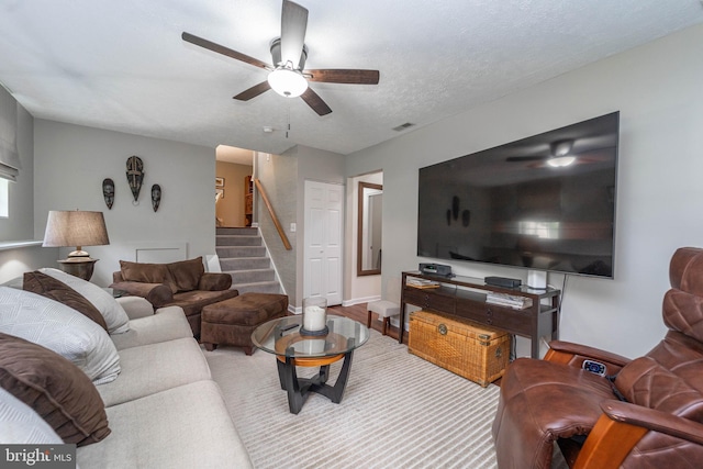 7781 Monaghan Rd, Glen Burnie, MD 21060 - living room featuring ceiling fan, stairs, and wood finished floors