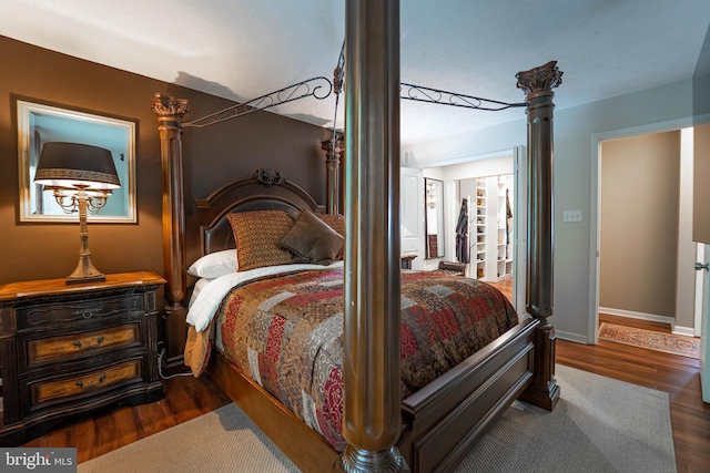 7781 Monaghan Rd, Glen Burnie, MD 21060 - bedroom with wood finished floors and decorative columns