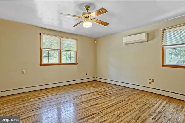 34 Barrett Ave, Hammonton, NJ 08037 - empty room featuring a wall unit AC, wood finished floors, ceiling fan, and baseboard heating