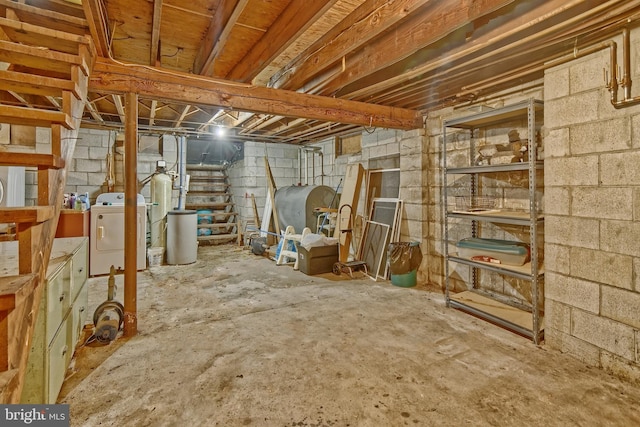 34 Barrett Ave, Hammonton, NJ 08037 - unfinished below grade area with oil tank, washing machine and clothes dryer, and stairway
