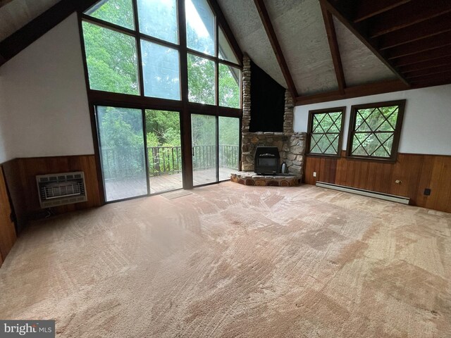 175 Howellsville Rd, Front Royal, VA 22630 - unfurnished living room featuring a fireplace, baseboard heating, carpet flooring, heating unit, and wooden walls