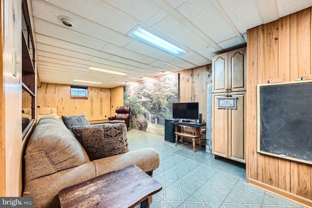 12105 Lanham Severn Rd, Bowie, MD 20720 - living room with wooden walls and light floors