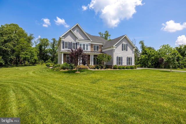 14309 Oak Meadow Rd, Baldwin, MD 21013 - traditional-style house with a front lawn, a standing seam roof, and a metal roof