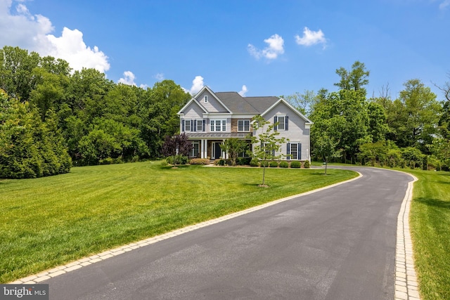 14309 Oak Meadow Rd, Baldwin, MD 21013 - view of front of property featuring a front yard and asphalt driveway