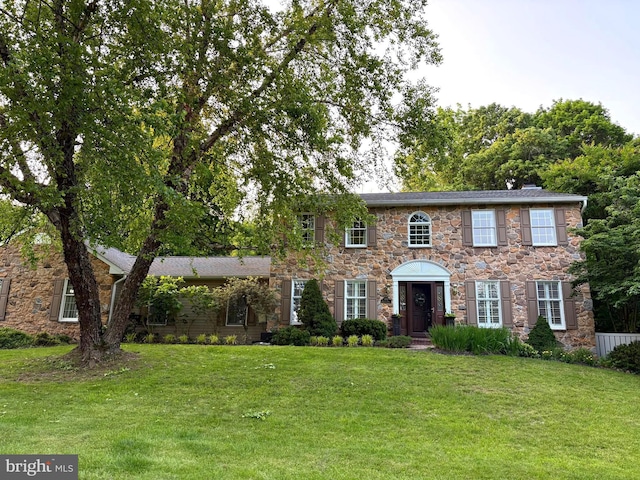 333 Huffman Dr, Exton, PA 19341 - colonial home featuring stone siding and a front lawn