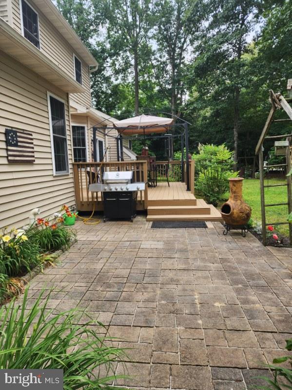 71 Gardenia Blvd, Greenwood, DE 19950 - view of patio / terrace featuring a wooden deck and area for grilling