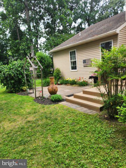 71 Gardenia Blvd, Greenwood, DE 19950 - view of green lawn with a patio area