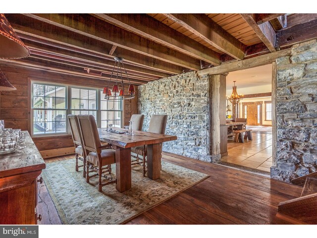 2103 Street Rd, New Hope, PA 18938 - dining room featuring a chandelier, a wooden ceiling with exposed beams, and wood-type flooring