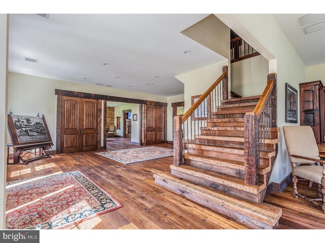2103 Street Rd, New Hope, PA 18938 - entrance foyer featuring hardwood / wood-style floors and stairs