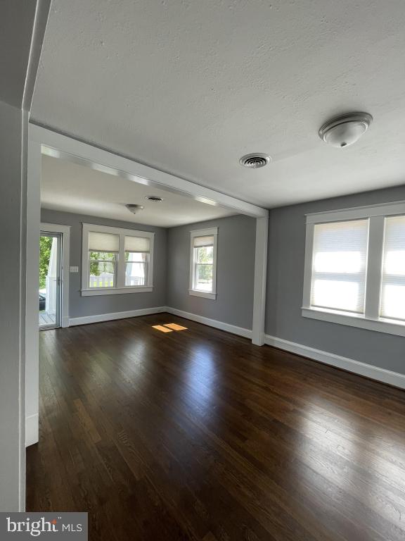 309 Progress St, Fredericksburg, VA 22401 - spare room with wood finished floors and a textured ceiling