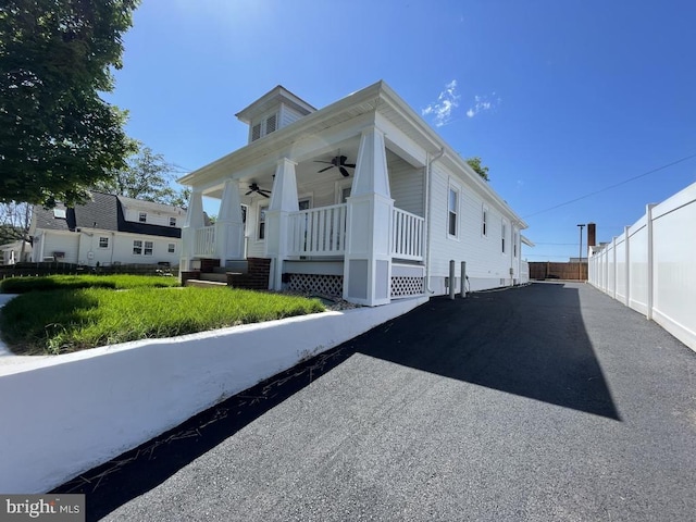 309 Progress St, Fredericksburg, VA 22401 - view of side of property with a ceiling fan and a porch