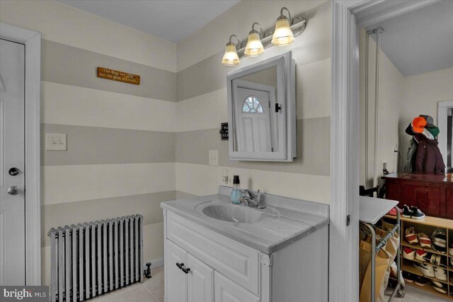 120 Hook St, Birdsboro, PA 19508 - bathroom featuring radiator heating unit, vanity, and tile patterned flooring
