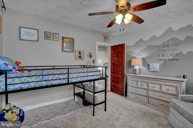 120 Hook St, Birdsboro, PA 19508 - bedroom with carpet floors, a textured ceiling, and a ceiling fan