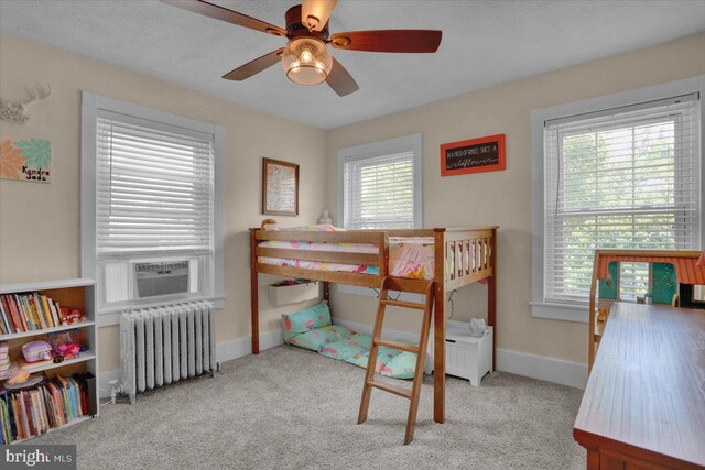 120 Hook St, Birdsboro, PA 19508 - carpeted bedroom featuring radiator heating unit, cooling unit, and a ceiling fan