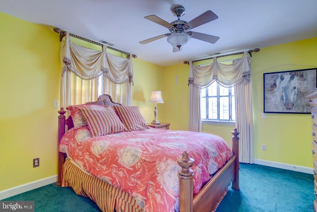 6180 Marsh Island Dr, Chincoteague Island, VA 23336 - carpeted bedroom featuring baseboards and a ceiling fan