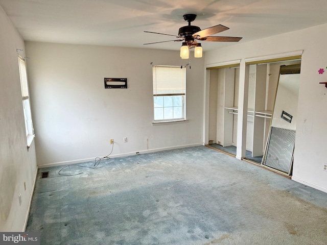 2575 Romig Rd, Gilbertsville, PA 19525 - unfurnished bedroom featuring two closets, carpet flooring, and ceiling fan