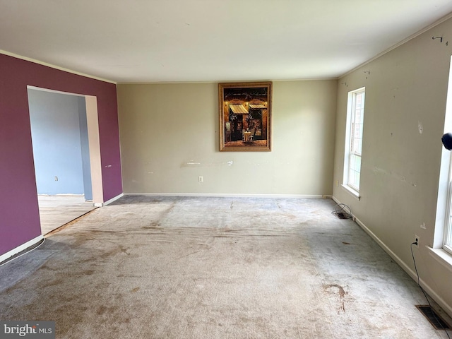 2575 Romig Rd, Gilbertsville, PA 19525 - carpeted spare room with crown molding and baseboards