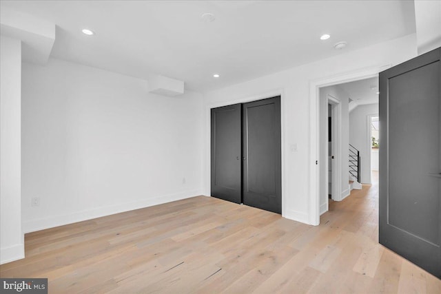 2618 E Hagert St, Philadelphia, PA 19125 - unfurnished bedroom with light wood-style flooring, recessed lighting, and a closet