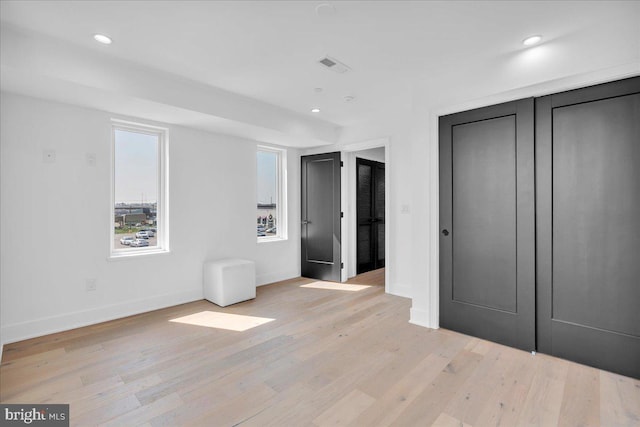 2618 E Hagert St, Philadelphia, PA 19125 - unfurnished bedroom featuring light wood-type flooring, recessed lighting, and a closet