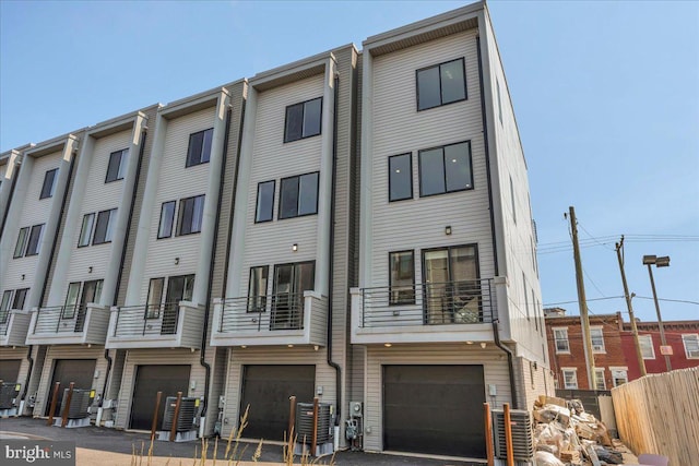 2618 E Hagert St, Philadelphia, PA 19125 - view of property featuring an attached garage