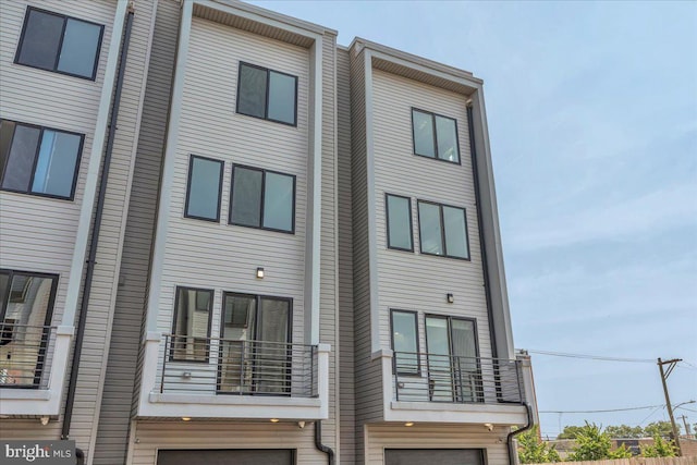 2618 E Hagert St, Philadelphia, PA 19125 - back of house with an attached garage and a balcony
