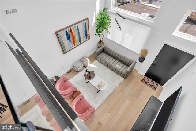 2618 E Hagert St, Philadelphia, PA 19125 - living area featuring wood finished floors and a towering ceiling