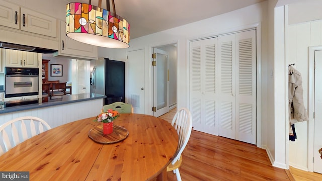 1047 Brookfield Cir, Quakertown, PA 18951 - dining area featuring light wood-style floors and baseboard heating