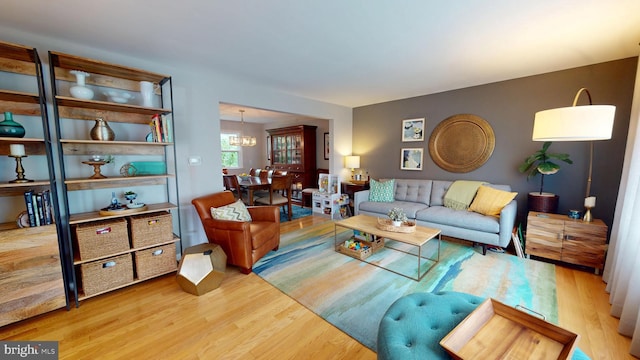 1047 Brookfield Cir, Quakertown, PA 18951 - living room with wood finished floors and a chandelier