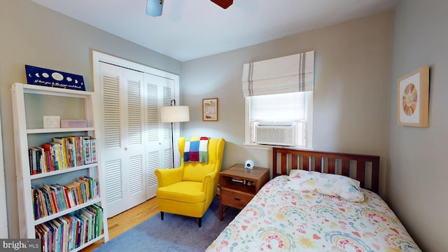 1047 Brookfield Cir, Quakertown, PA 18951 - bedroom featuring a closet, cooling unit, wood finished floors, and a ceiling fan