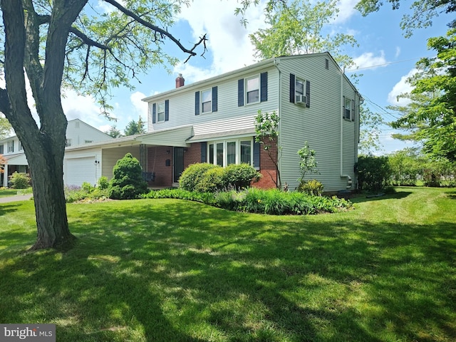 1047 Brookfield Cir, Quakertown, PA 18951 - traditional-style house featuring an attached garage, a chimney, a front yard, and brick siding