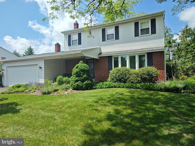 1047 Brookfield Cir, Quakertown, PA 18951 - traditional-style home featuring a garage, brick siding, a chimney, and a front lawn