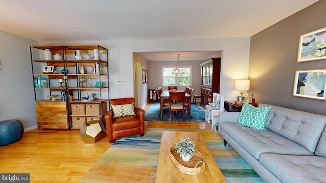 1047 Brookfield Cir, Quakertown, PA 18951 - living room featuring a chandelier and wood finished floors