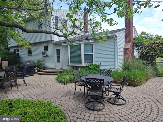 1047 Brookfield Cir, Quakertown, PA 18951 - view of patio / terrace with a grill, outdoor dining space, and cooling unit
