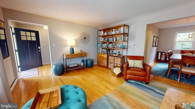 1047 Brookfield Cir, Quakertown, PA 18951 - living room featuring a baseboard radiator and wood finished floors
