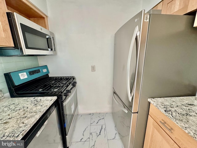 2205 Greenery Ln Unit 104-9, Silver Spring, MD 20906 - kitchen featuring stainless steel appliances, light marble finish floors, light brown cabinetry, decorative backsplash, and light stone counters
