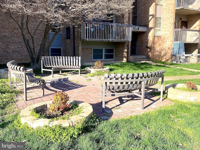 2205 Greenery Ln Unit 104-9, Silver Spring, MD 20906 - patio / terrace featuring an outdoor fire pit and a patio
