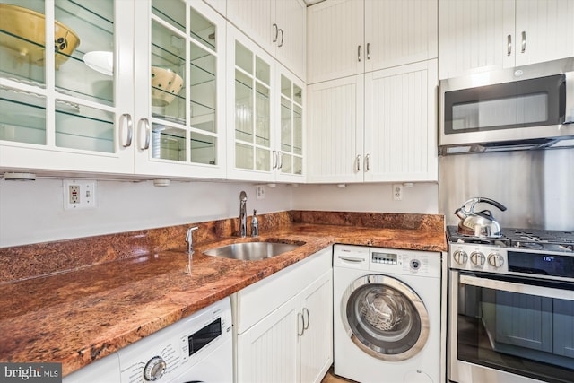 3042 R St NW Unit 2, Washington, DC 20007 - laundry area with washer / dryer