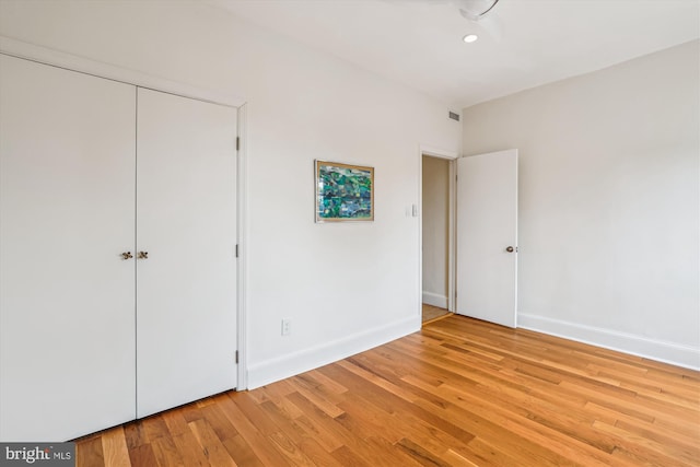 3042 R St NW Unit 2, Washington, DC 20007 - unfurnished bedroom with light wood finished floors, a closet, and recessed lighting