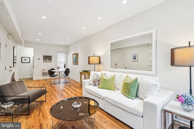 3042 R St NW Unit 2, Washington, DC 20007 - living room featuring wood finished floors and recessed lighting