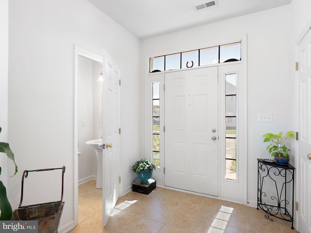 111 Sandridge Ct Unit 6-Jul, Millsboro, DE 19966 - entryway with healthy amount of natural light and light tile patterned flooring