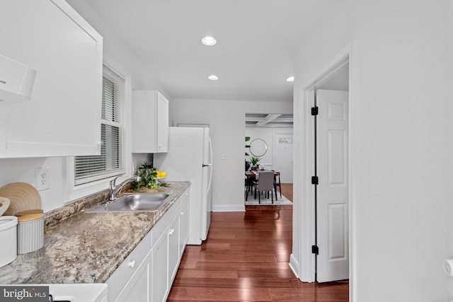 950 E W Hwy, Takoma Park, MD 20912 - kitchen with dark wood-style flooring, freestanding refrigerator, white cabinets, and recessed lighting