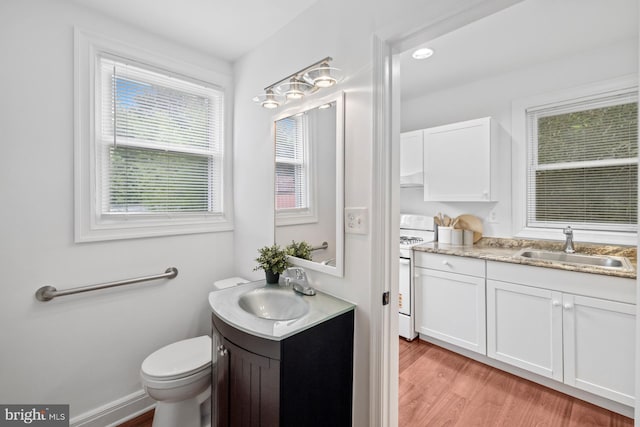 950 E W Hwy, Takoma Park, MD 20912 - bathroom featuring vanity and wood finished floors