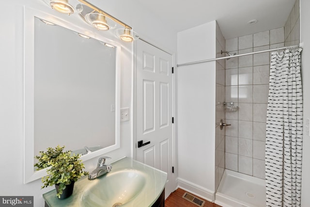 950 E W Hwy, Takoma Park, MD 20912 - bathroom featuring vanity and a tile shower