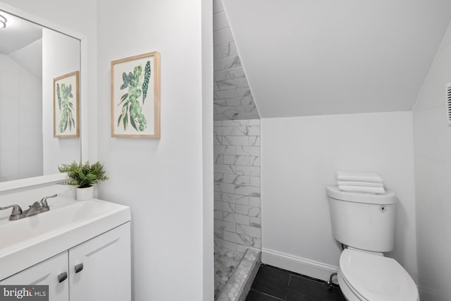 950 E W Hwy, Takoma Park, MD 20912 - bathroom featuring vanity, a tile shower, and marble look tile flooring