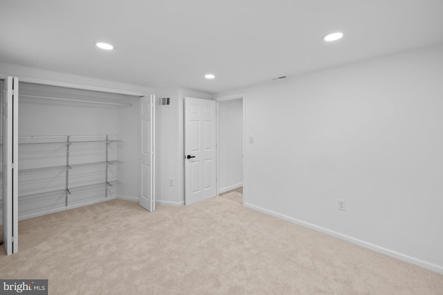 950 E W Hwy, Takoma Park, MD 20912 - unfurnished bedroom with recessed lighting, carpet flooring, and a closet