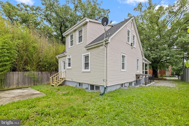 950 E W Hwy, Takoma Park, MD 20912 - view of side of home with entry steps and a shingled roof