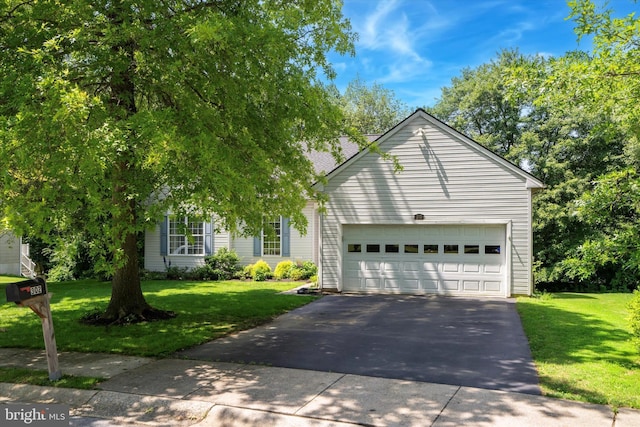 302 Cressent Ct, East Fallowfield Township, PA 19320 - view of front of home featuring driveway, a front lawn, and an attached garage