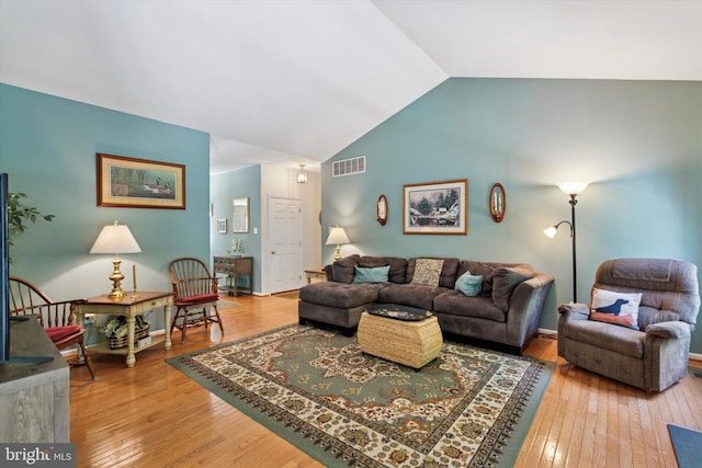 302 Cressent Ct, East Fallowfield Township, PA 19320 - living room featuring lofted ceiling and wood-type flooring