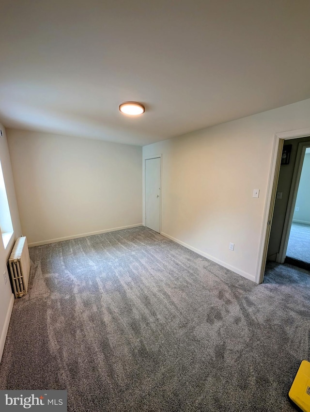 420 4th Ave, Parkesburg, PA 19365 - spare room with radiator heating unit and carpet flooring